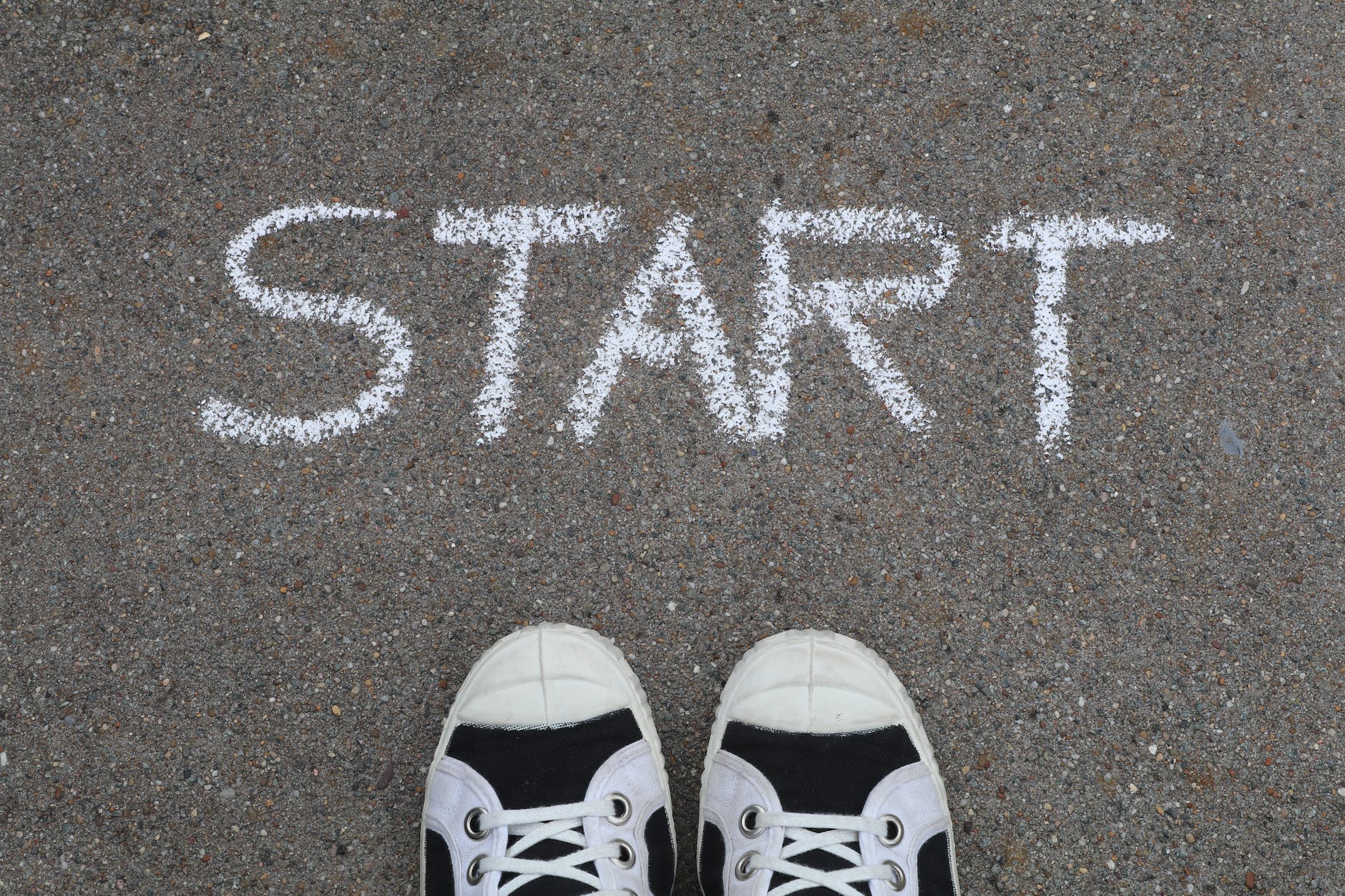start written on asphalt